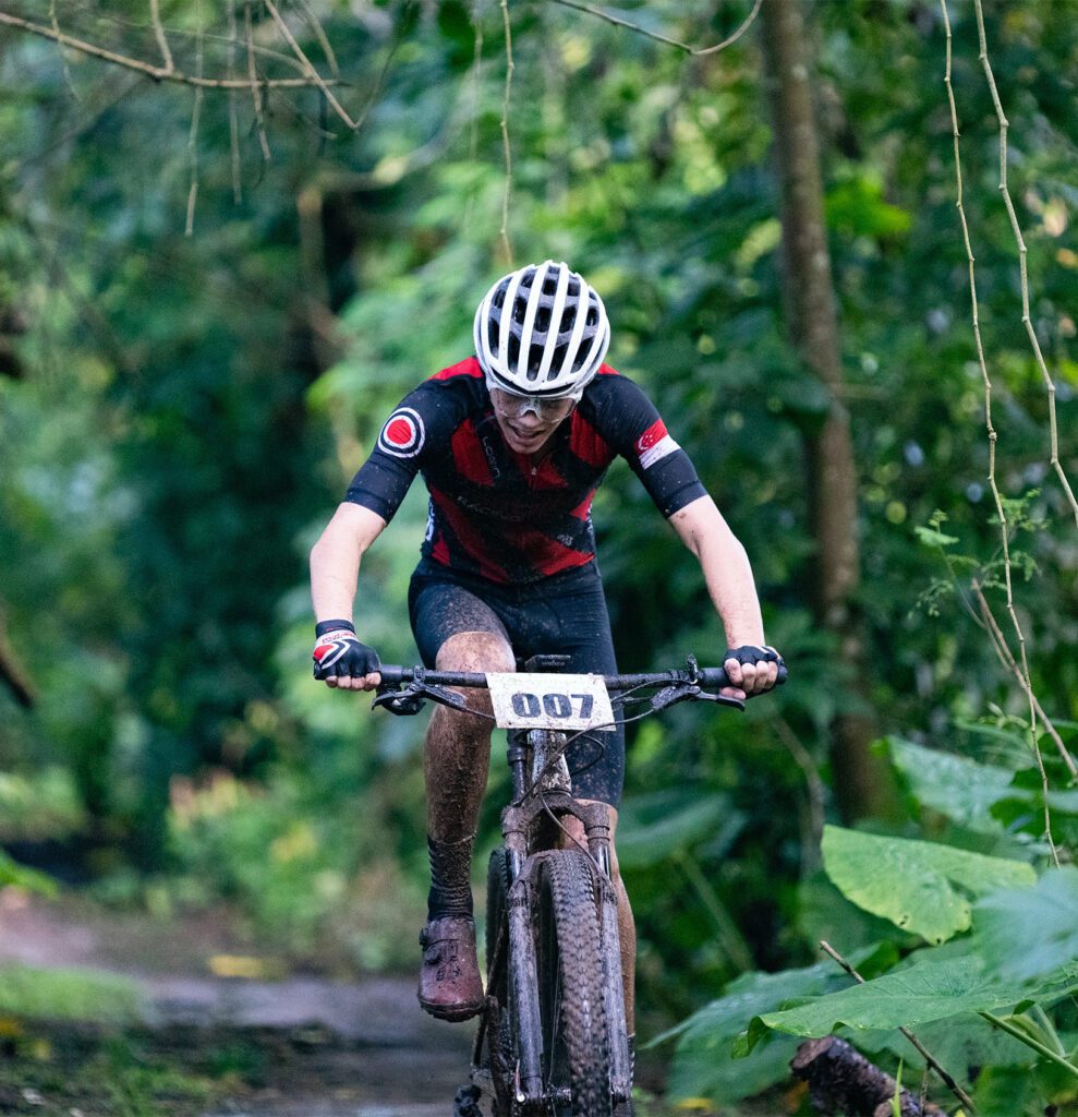 Front view of a cross-country mountain biker wearing a helmet